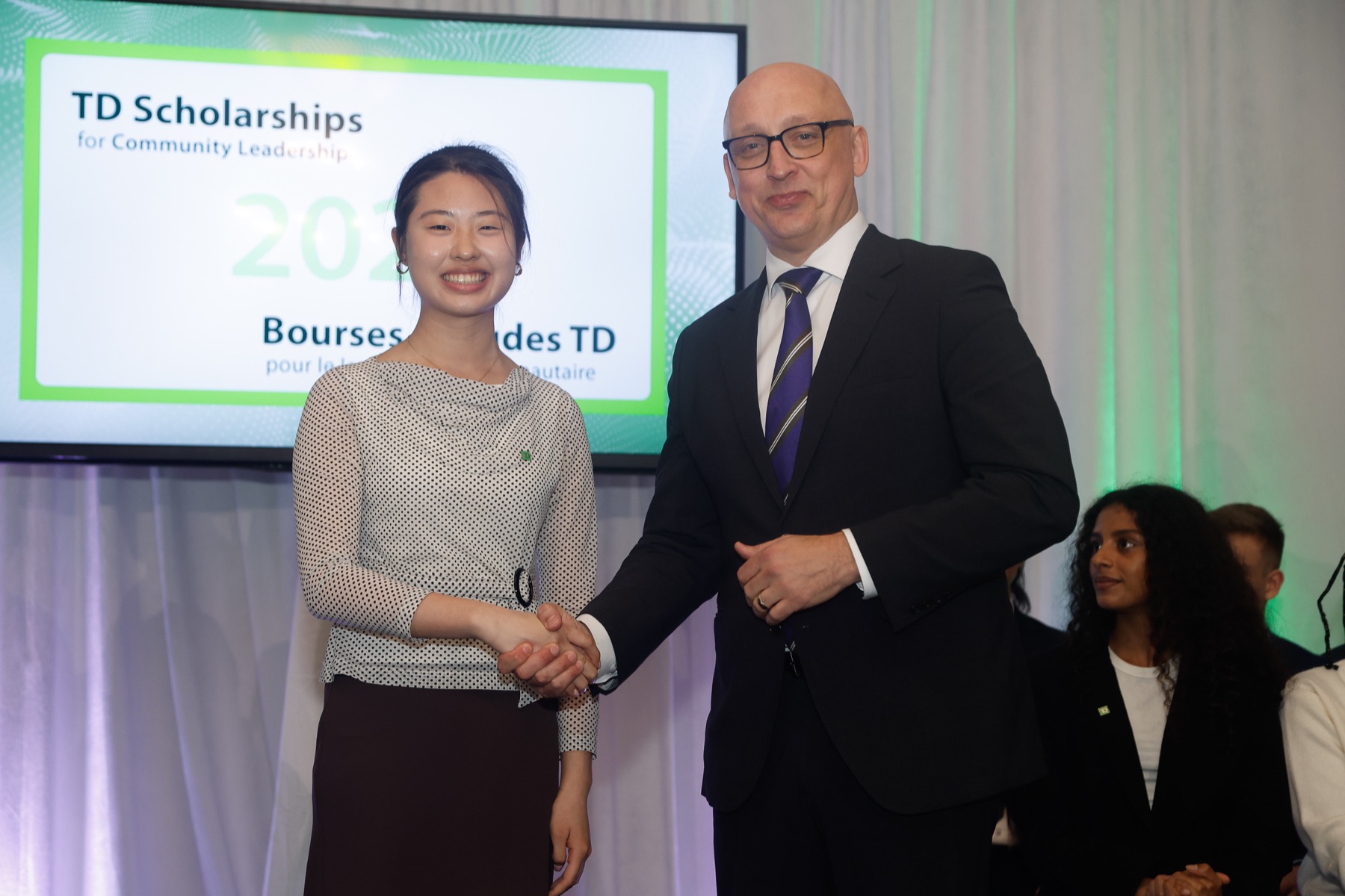 Lisa receiving recognition at the TD Scholarships event